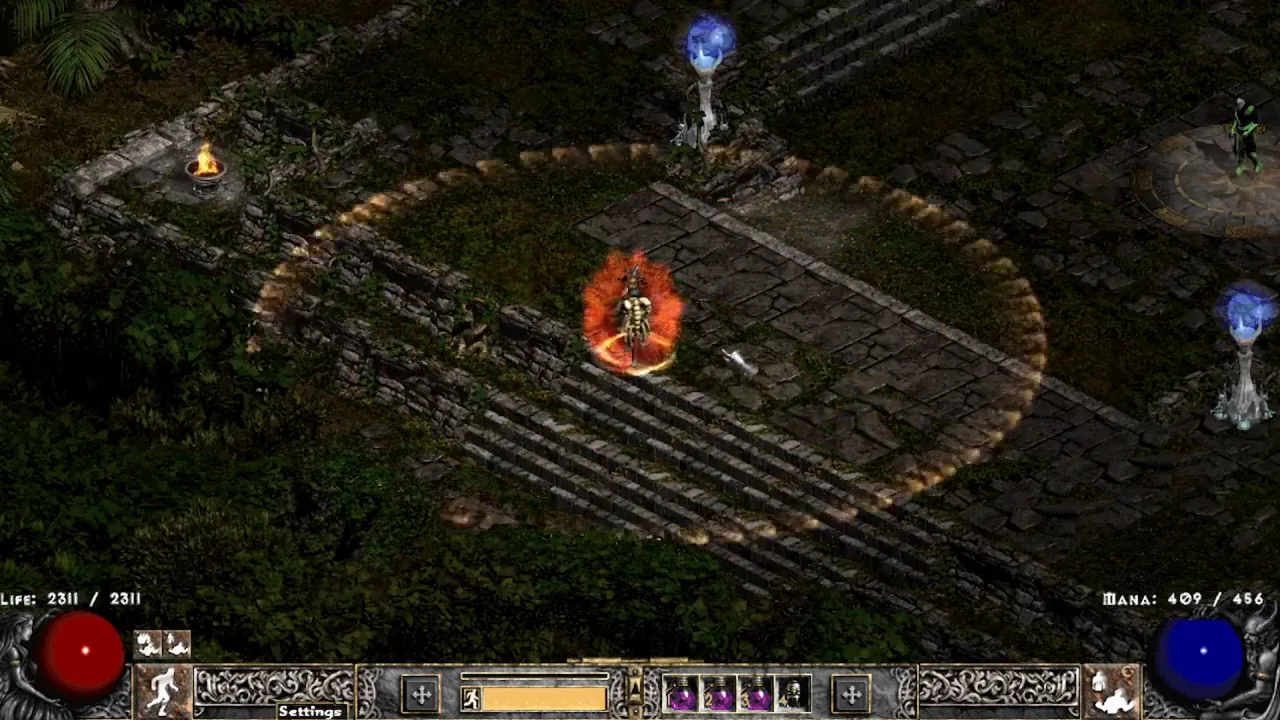 Mendeln's arena: mossy stone ruins and stairs, with two Ancient Spires (pillars topped by glowing blue orbs) and Mendeln on a round rune platform at the top right.